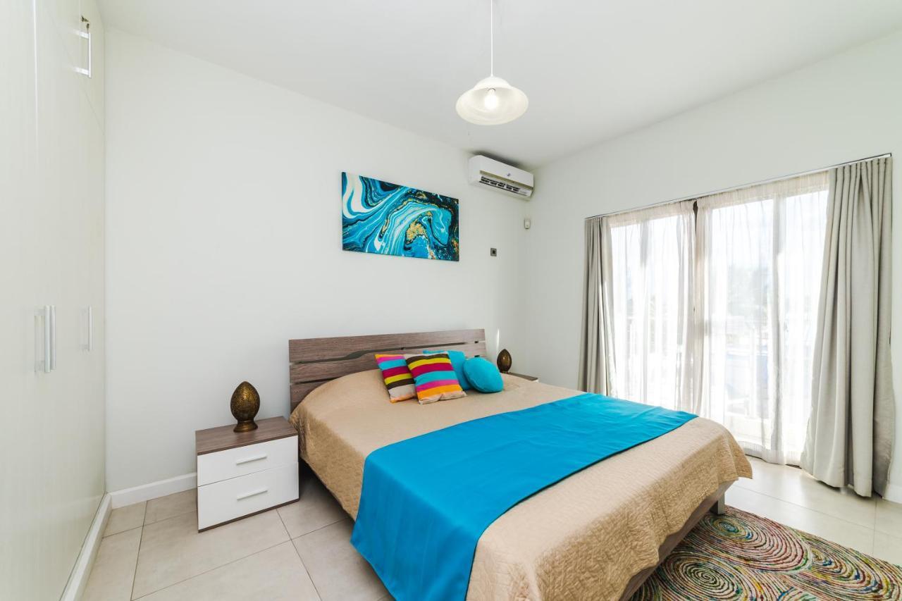 Beachcove Apartment 9 In Pereybere Pereybere Beach Bagian luar foto