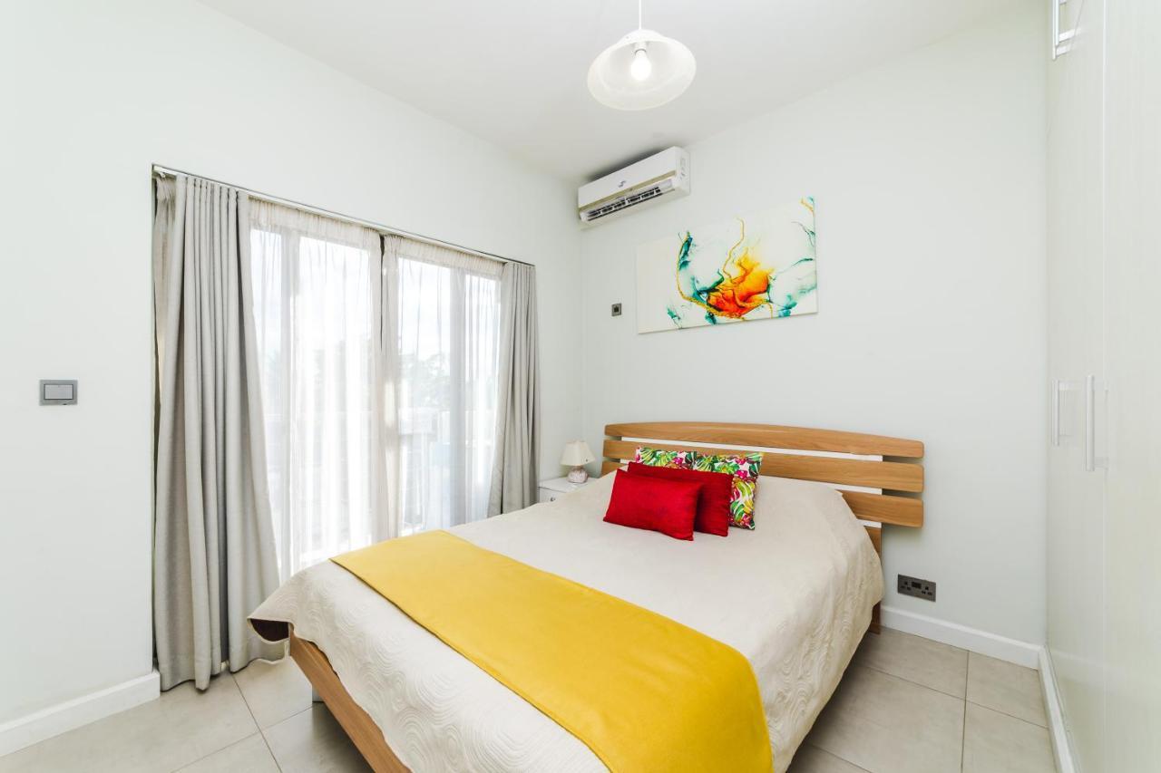 Beachcove Apartment 9 In Pereybere Pereybere Beach Bagian luar foto