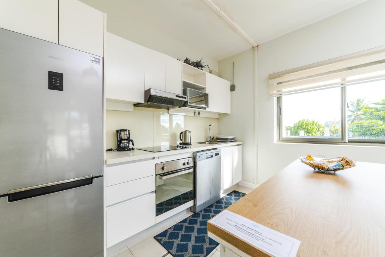 Beachcove Apartment 9 In Pereybere Pereybere Beach Bagian luar foto